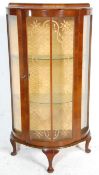 An early 20th Century 1930's Art Deco walnut demi lune display cabinet of good small proportions,