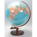 A 20th century retro revolving desk top terrestrial globe having illuminated effect on stepped