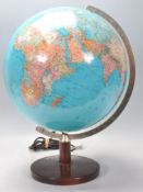 A 20th century retro revolving desk top terrestrial globe having illuminated effect on stepped