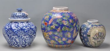 A large early 20th Century Chinese ginger jar enamelled with butterflies and floral decoration