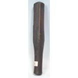 A Polynesian tribal carved wooden kapa cloth beater club of square form having incised carved