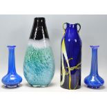 A selection of vintage retro studio art glass to include a blue and yellow cased glass vase with