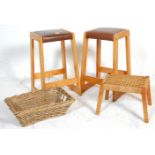 A collection of vintage stools to include two retro 1980's wooden and brown leather stitched seat