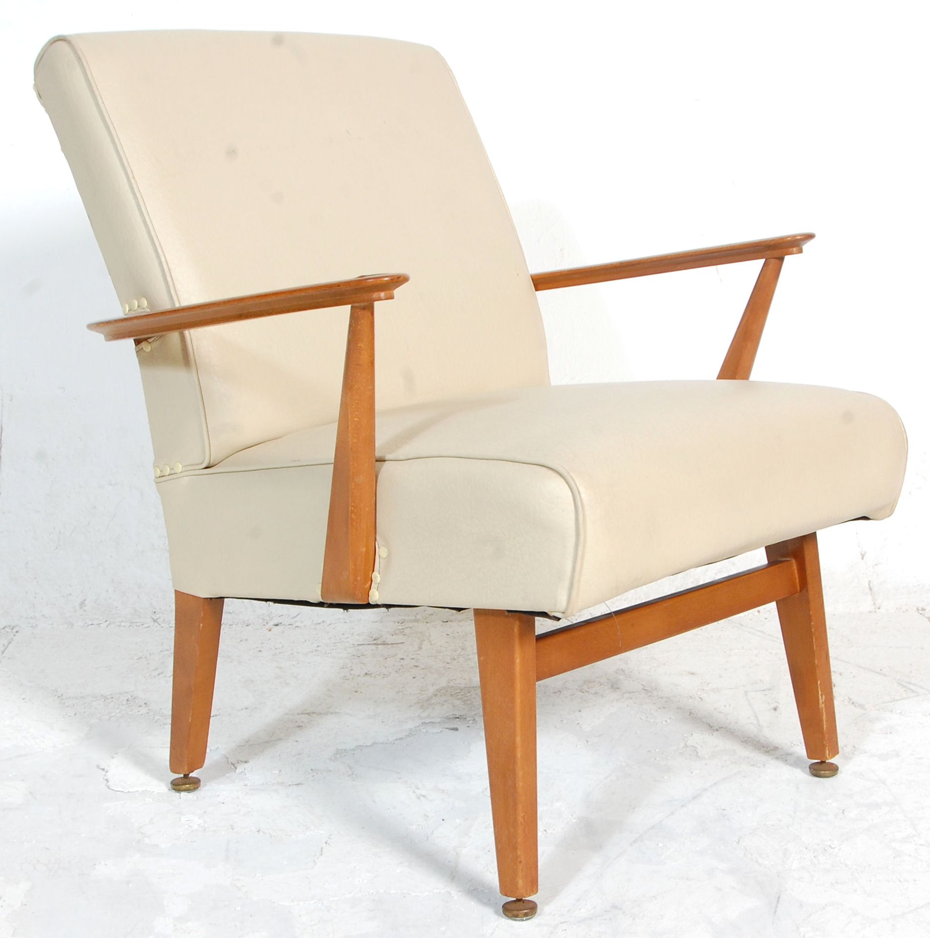 A good retro 20th Century teak framed armchair / chair having a white leather covered backrest and