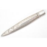 An antique Edwardian  hallmarked sterling silver needle case in the form of a feather with etched
