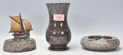 A group of three vintage Cornish serpentine mineral stone items to include a flared neck vase,