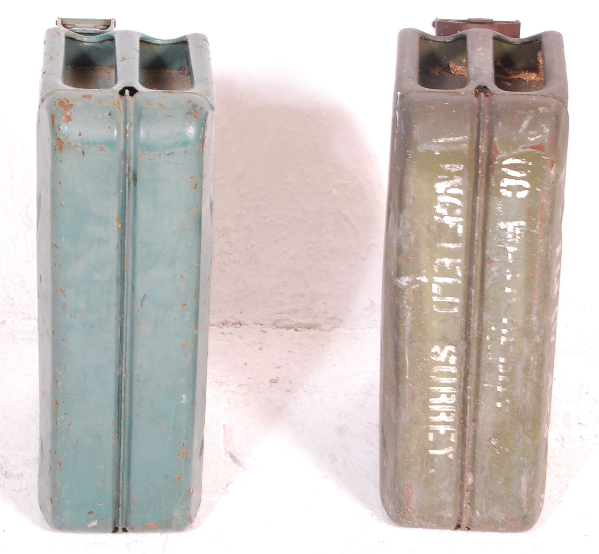 Two vintage 20th Century military jerry petrol cans, both retaining original green paintwork with - Bild 5 aus 5