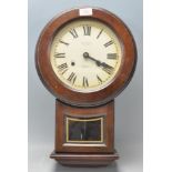 A contemporary Victoria President 31 day mahogany cased wall clock set in shaped case with glass