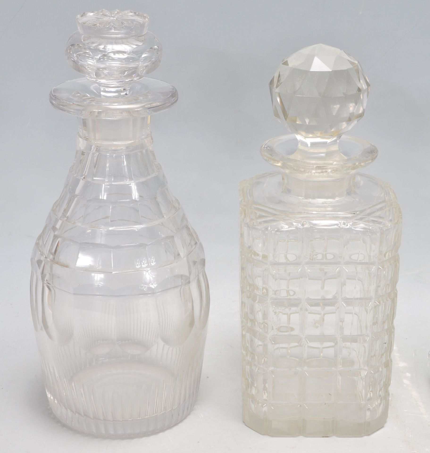 A group of seven vintage and antique cut glass decanters to include a pair of whiskey decanters with - Bild 2 aus 11