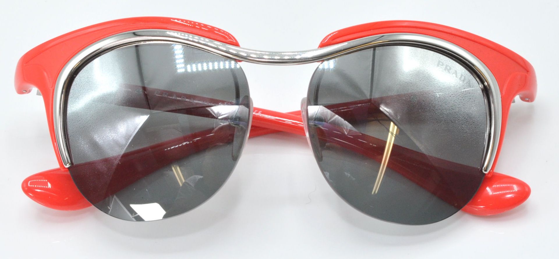 A pair of Prada ladies' fashion sunglasses having bright orange stems with reflective lenses, - Bild 7 aus 9