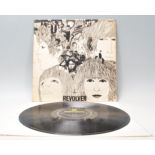 A vinyl long play LP record album by The Beatles – Revolver – Original Parlophone 1st U.K. Press –