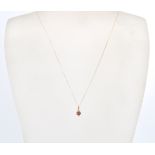 A 9ct gold pendant necklace together with a 9ct gold heart pendant. The necklace strung with a