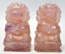 A good pair of Antique Chinese carved fluorspar temple fu dogs. Each measures 8cm tall.