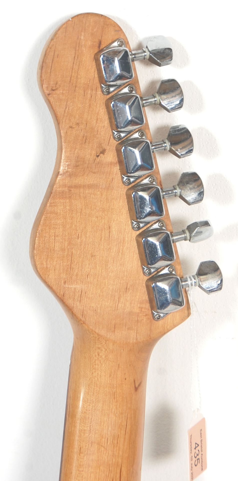 A Fender Stratocaster style Encore six string electric guitar having three control knobs with a - Bild 7 aus 7