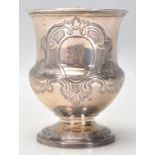 A 19th Century early Victorian silver hallmarked Christening cup having a scrolled design handle,