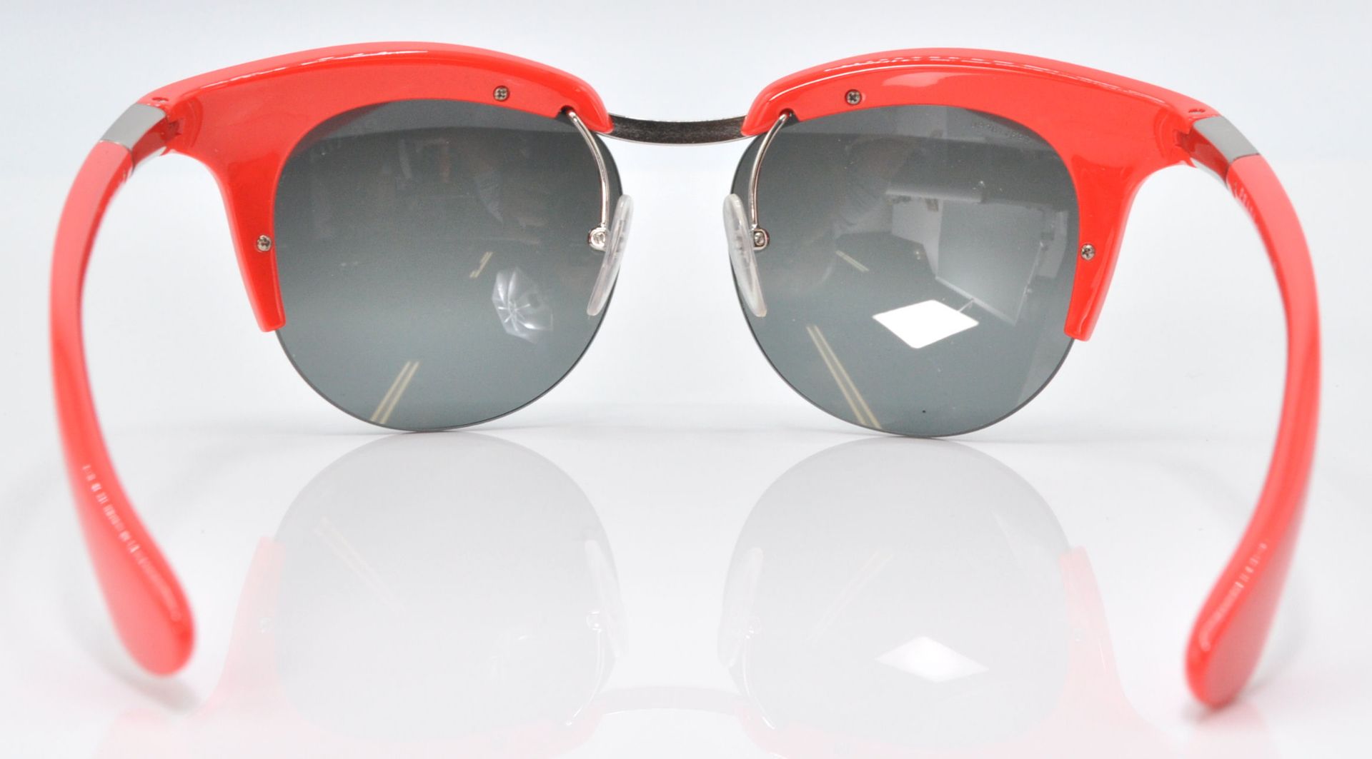 A pair of Prada ladies' fashion sunglasses having bright orange stems with reflective lenses, - Bild 5 aus 9