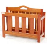 A retro 20th Century Danish teak wood retro magazine rack - canterbury. The panelled body with