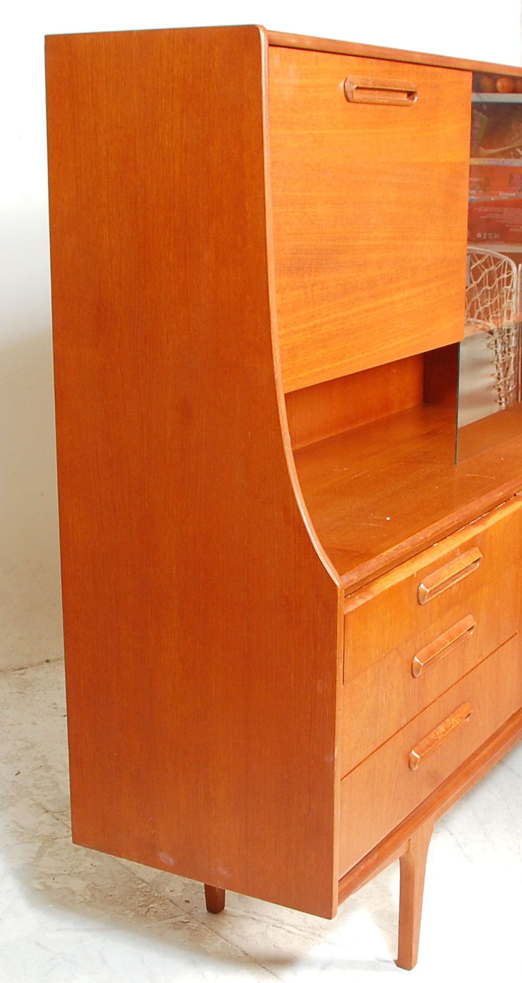 A retro mid 20th Century teak wood sideboard / highboard having a drop down cocktail cabinet to - Image 8 of 10