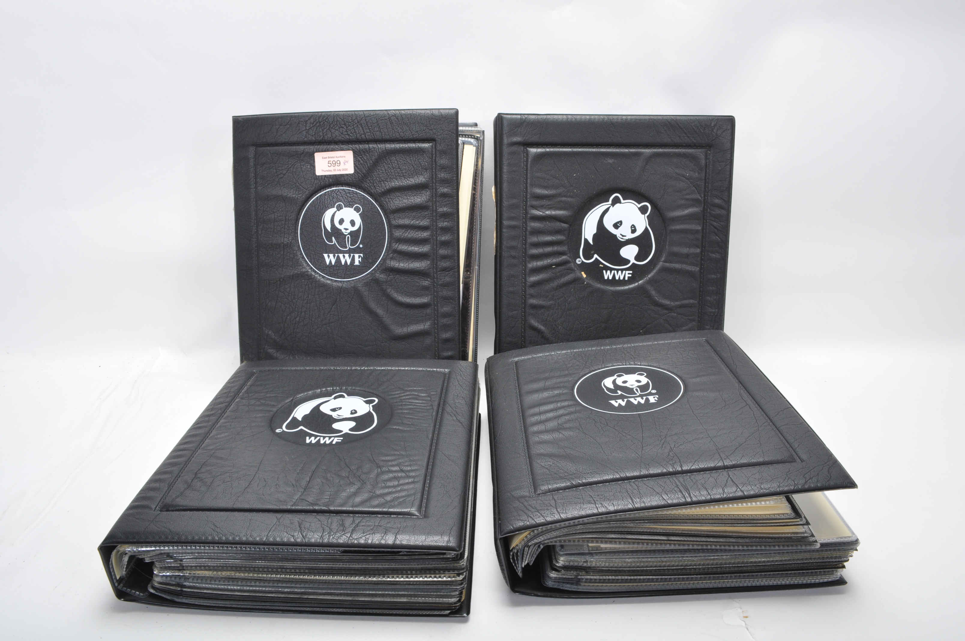 A group of five WWF stamp collectors albums filled with WWF special issue animals stamps, albums