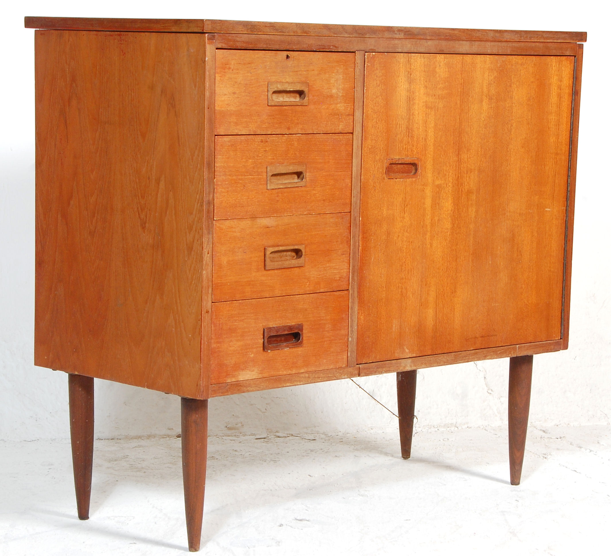 A mid century retro, circa 1970's teak wood sewing table cabinet – desk combination having fold