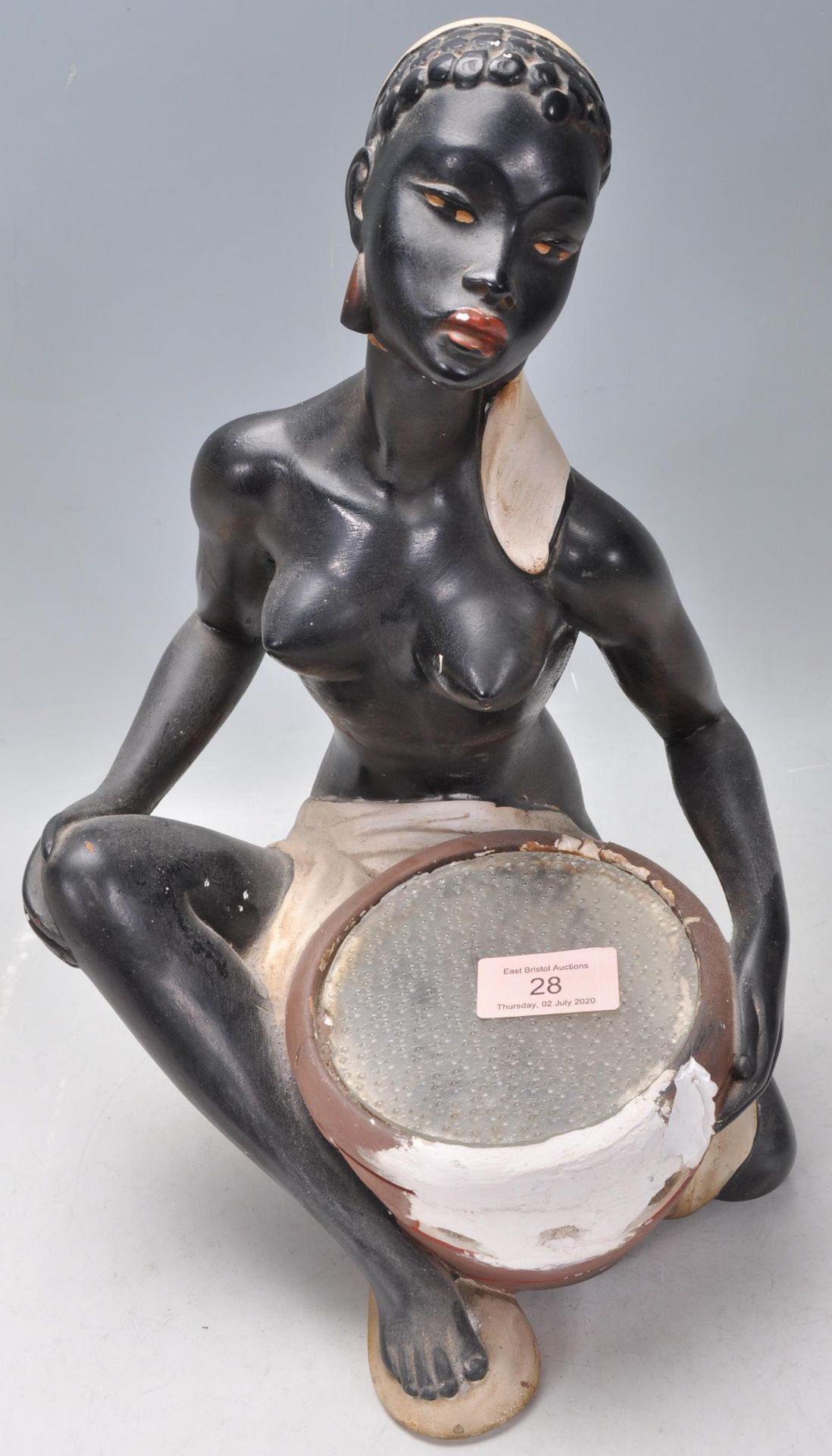 A vintage early 20th century Art Deco chalk 1920s ware figurine in the form of a seated African - Bild 5 aus 10