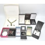 A collection of boxed silver jewellery to include roundel pendant and chani, facet cut glass pendant