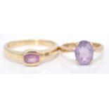 A hallmarked 9ct gold and amethyst single stone ring. The ring set with oval facet cut amethyst in