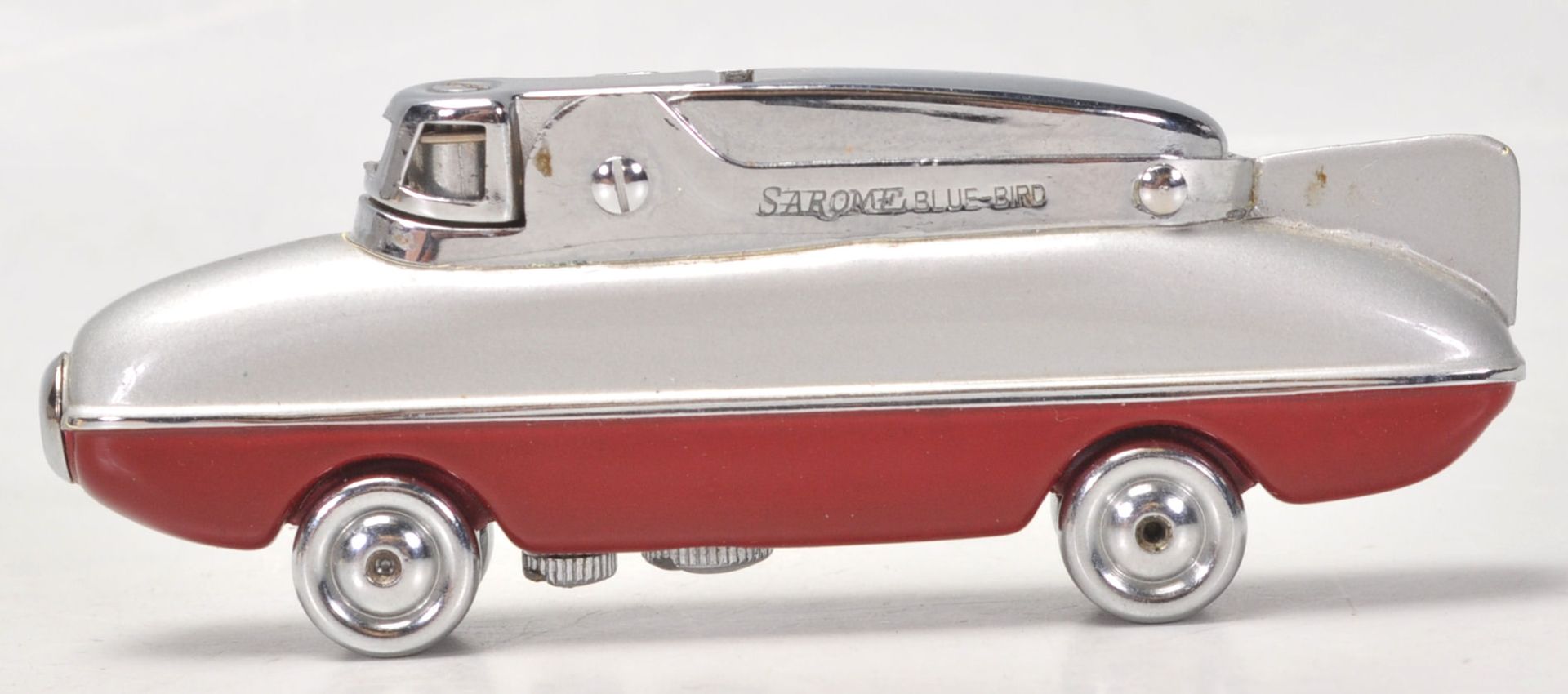 A mid 20th Century 1950's Sarome Bluebird novelty cigarette lighter, finished in red and grey with - Image 4 of 7