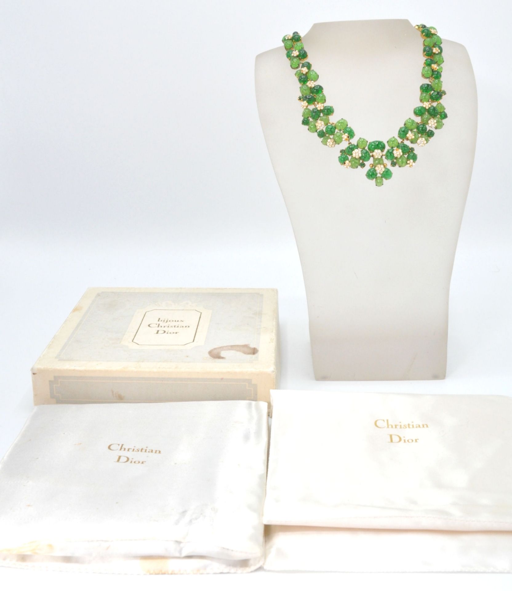 A signed mid century Christian Dior Bijoux Costume jewellery gilt metal and emerald cabochon glass