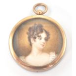 A framed 19th century hand painted portrait miniature of a fine young maiden being set in yellow