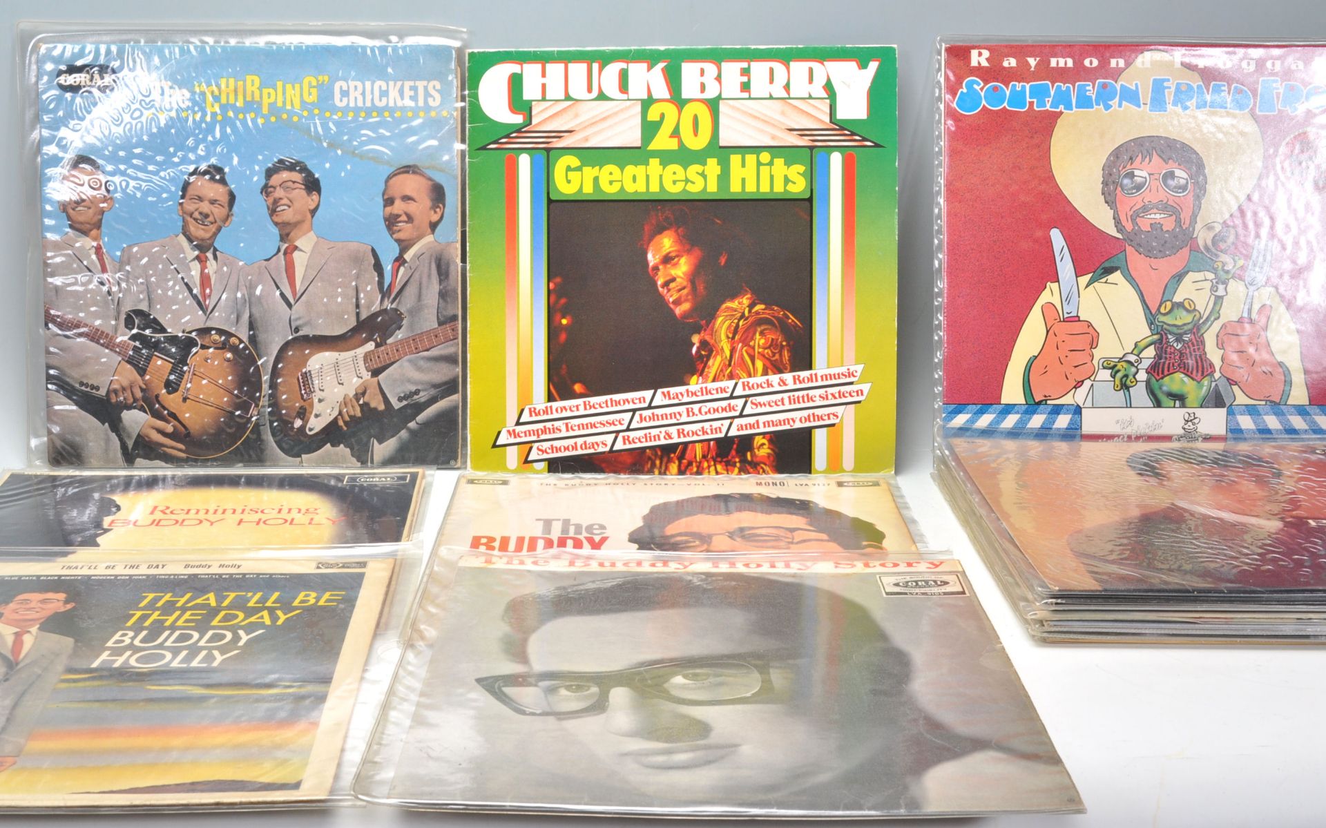 A group of vinyl long LP record albums to include The "Chirping" Crickets, multiple Buddy Holly