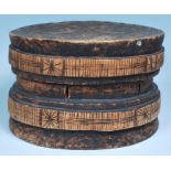 An African tribal Lega low circular stool from the Democratic Republic of the Congo having an