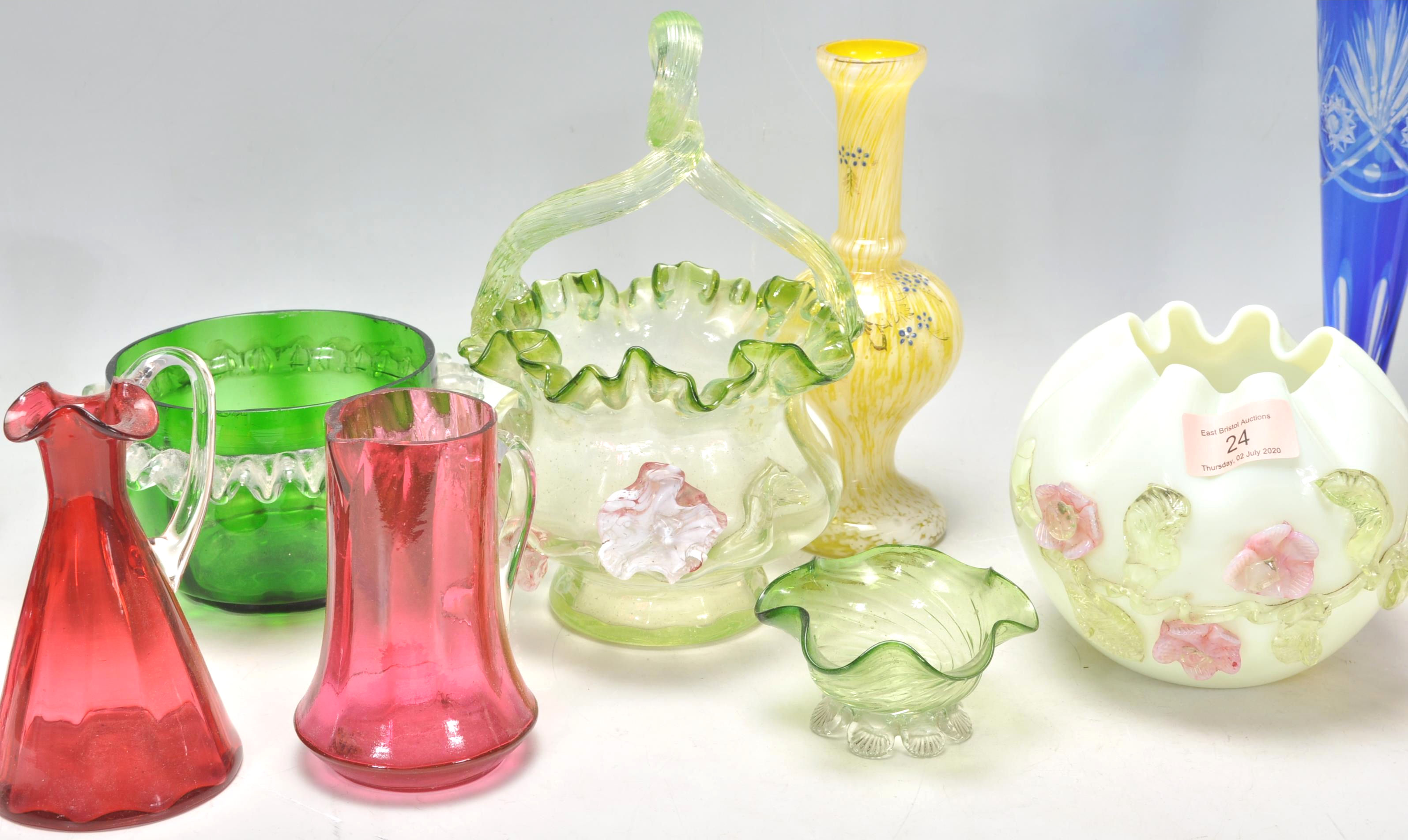 A group of 19th Century Victorian coloured glass vases to include a yellow and white vase with - Image 3 of 7