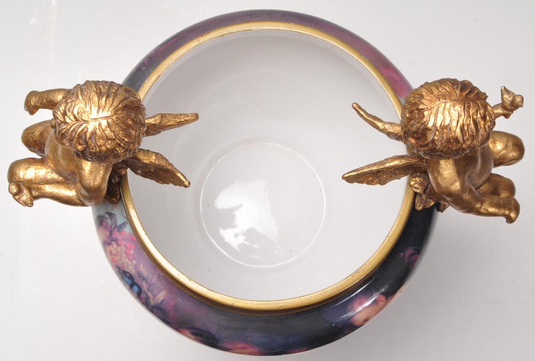 A 20th Century German porcelain jardiniere planter having gilt Maltese dolphin supports with shell - Image 6 of 7