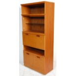 A retro mid 20th Century teak wood room unit having open shelves with a glazed shelf compartment,