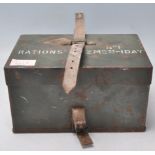 A WWII Second World War British military green painted rations box with leather strap. Measures 12.5