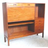 A brilliant mid 20th Century retro teak wood bureau desk / bookcase having two drawers above a