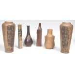 A collection of Chinese vases, all of stoneware construction to include a tall solifleur vase,