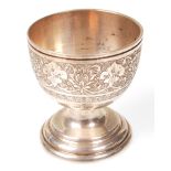 An Islamic silver 84 marked egg cup. The egg cup w