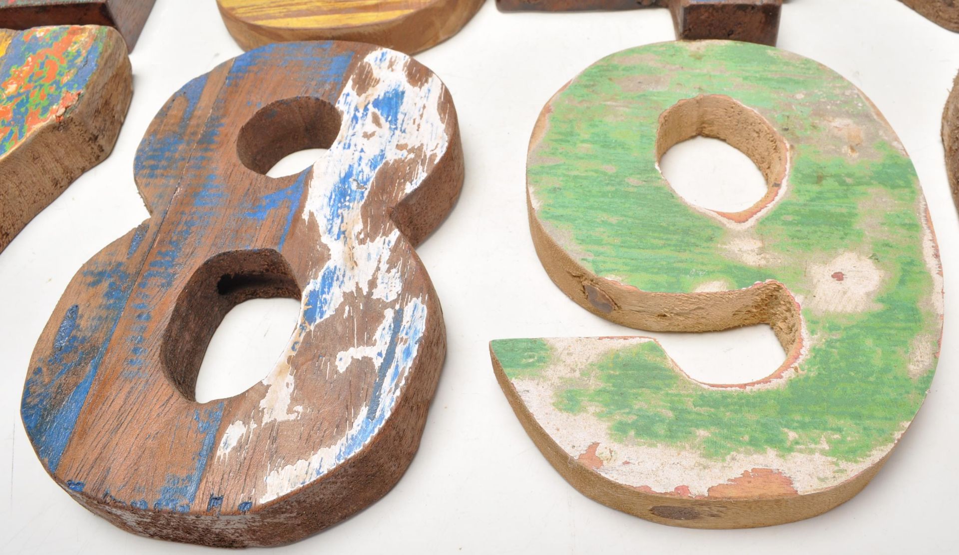 A set of vintage retro wooden signage numbers each having weathered different coloured paintwork - Image 6 of 8
