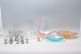 A mixed group of retro 20th Century glassware items to include Orrefors clear glass bowl, Murano