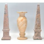 A good pair of antique neoclassical carved marble obelisk mantelpiece ornaments, each being raised