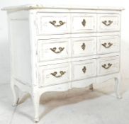 A 19th Century French white painted wood Louis XV style commode - chest of drawers having three