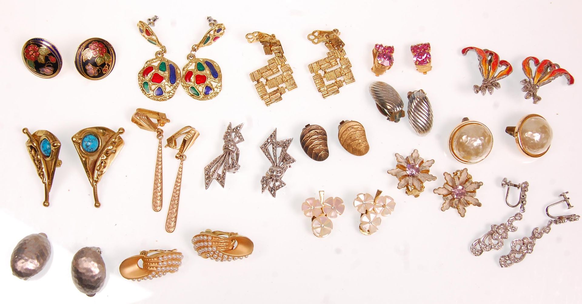 A collection of sixteen vintage ladies clip on earrings to include marcasite examples, enamelled