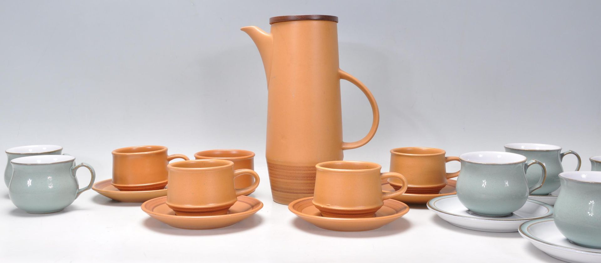 A vintage retro 20th Century Purbeck pottery coffee service consisting of four brown glazed coffee