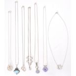 A collection of silver necklace chains to include pendants to each. Fine linked with stone set, fine