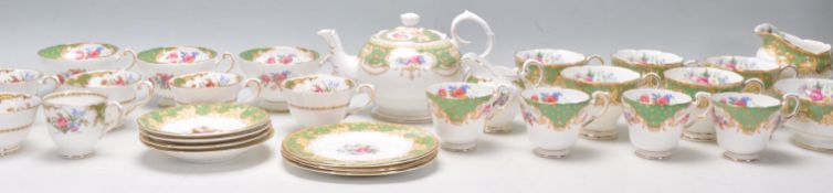 A mixed group of vintage Fine Bone China English part tea sets with green and gilt decoration.