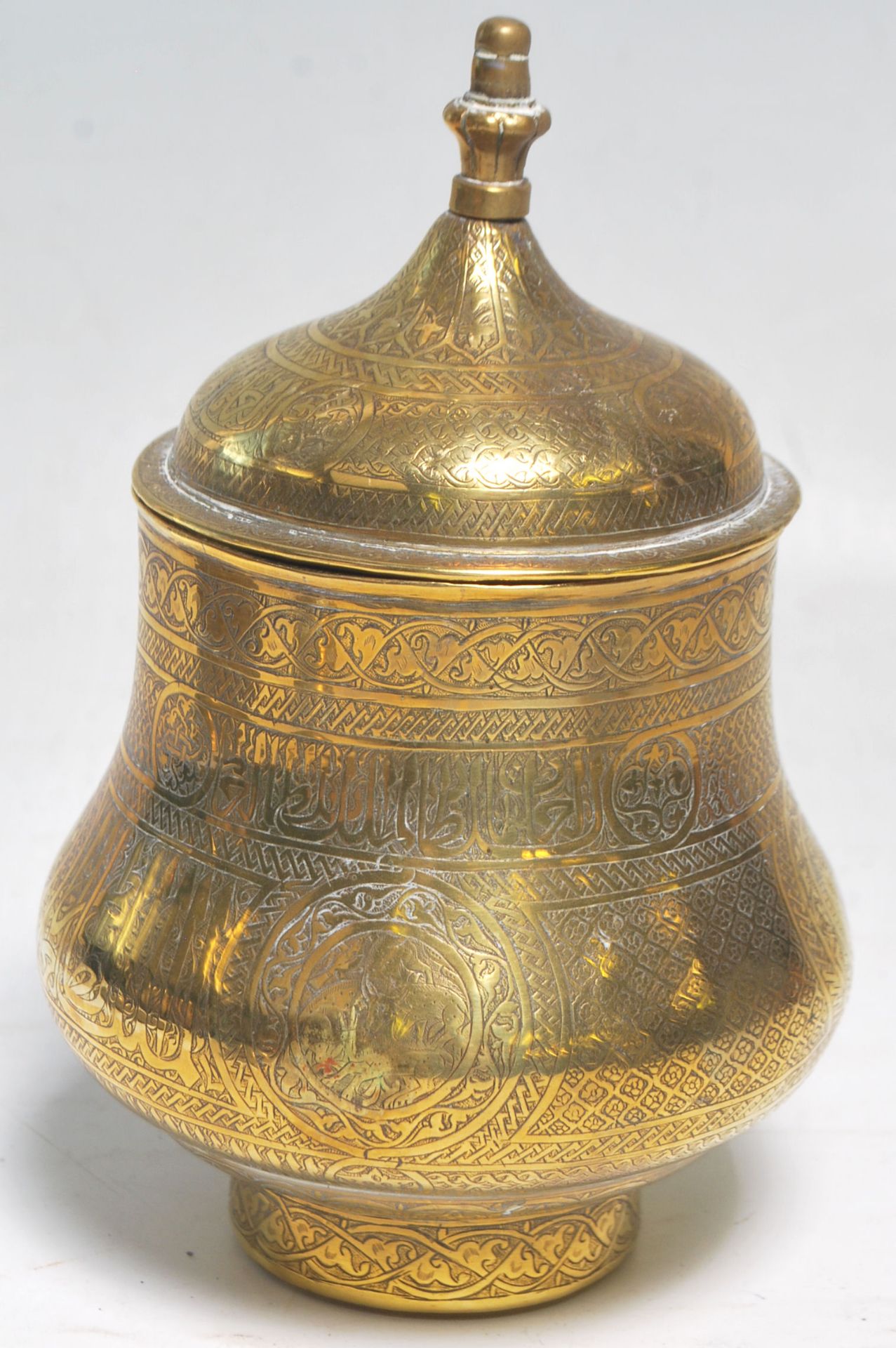 A collection of antique brass ware to include a Middle Eastern Islamic decorated lidded having - Bild 6 aus 11