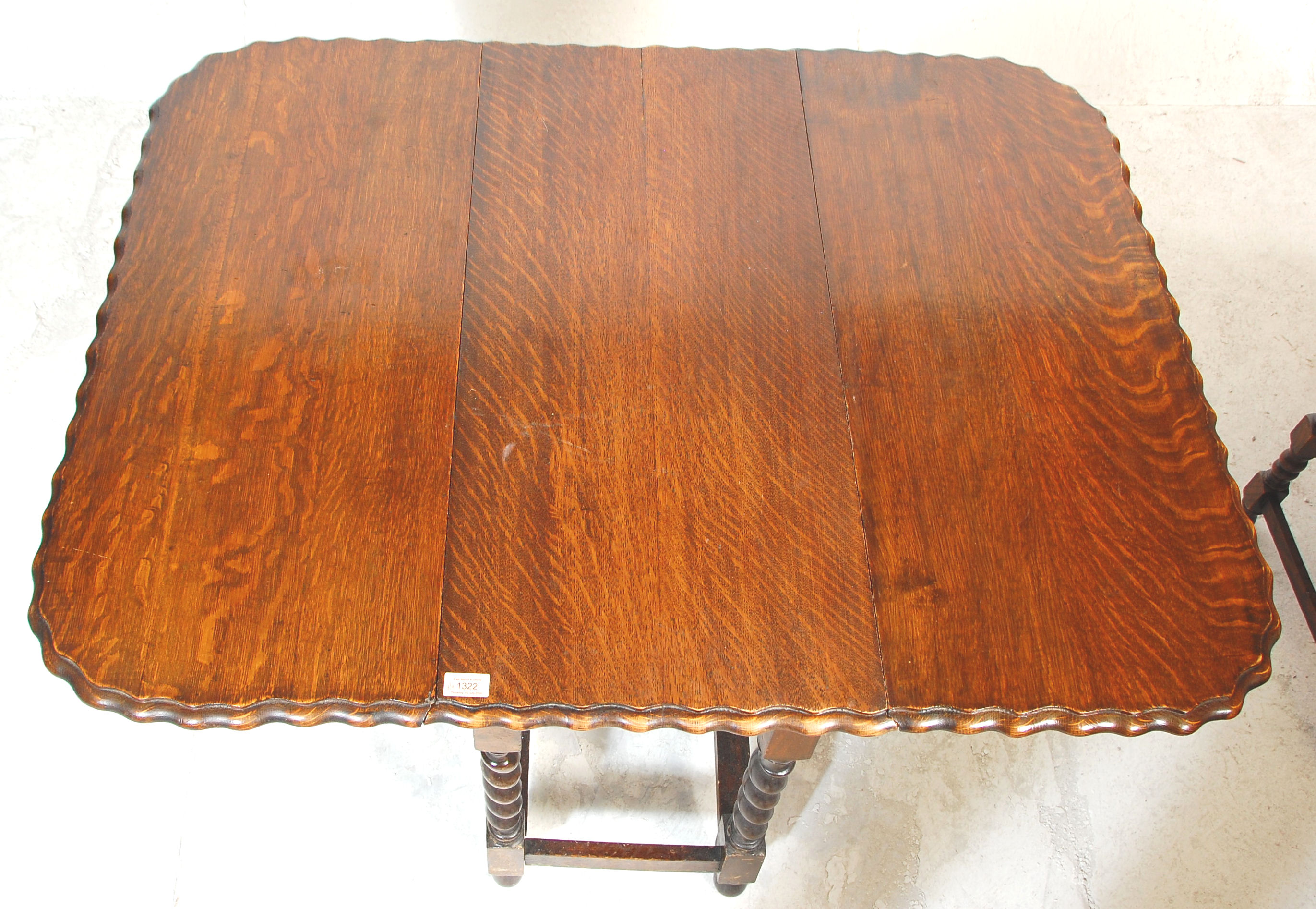 A good early 20th Century oak pie crust barley twist gate leg dining table of rectangular form - Image 8 of 15