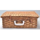A vintage 1950s picnic basket / hamper fitted with plastic wares.